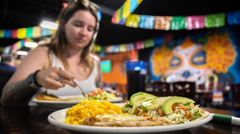 Woman eating at Mexican restaurant in Willcox, Arizona